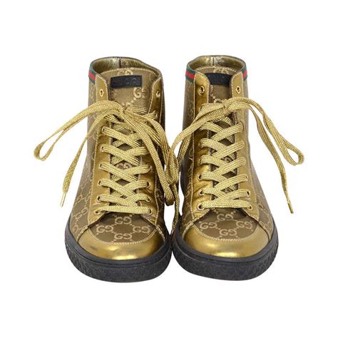 gold gucci sneakers men's|gucci sandals women gold.